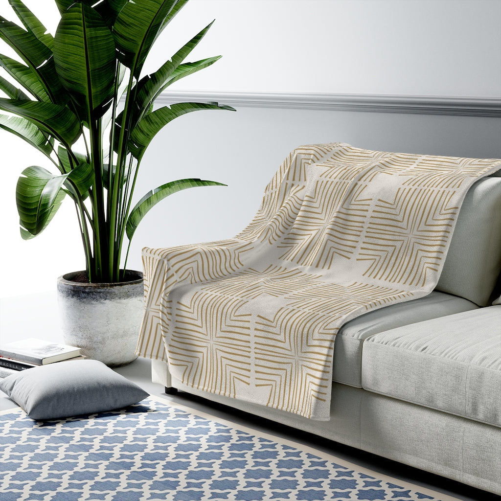 Plush velveteen throw blanket with patterned design in rich jewel tones