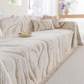 Chunky plush winter throw blanket in warm mid-century geometric pattern