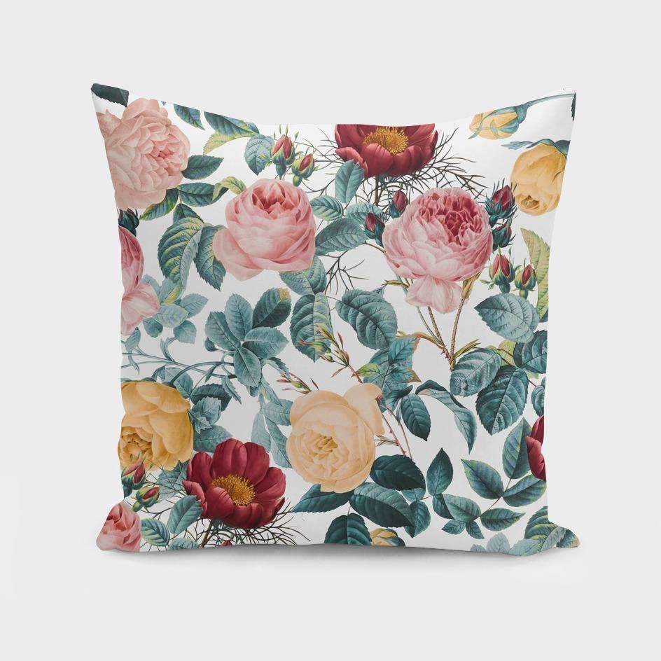 Floral vintage-style cushion cover with botanical garden print in muted tones