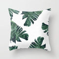 Cushion cover with watercolour banana leaf botanical print in green tones