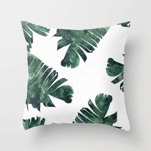 Cushion cover with watercolour banana leaf botanical print in green tones